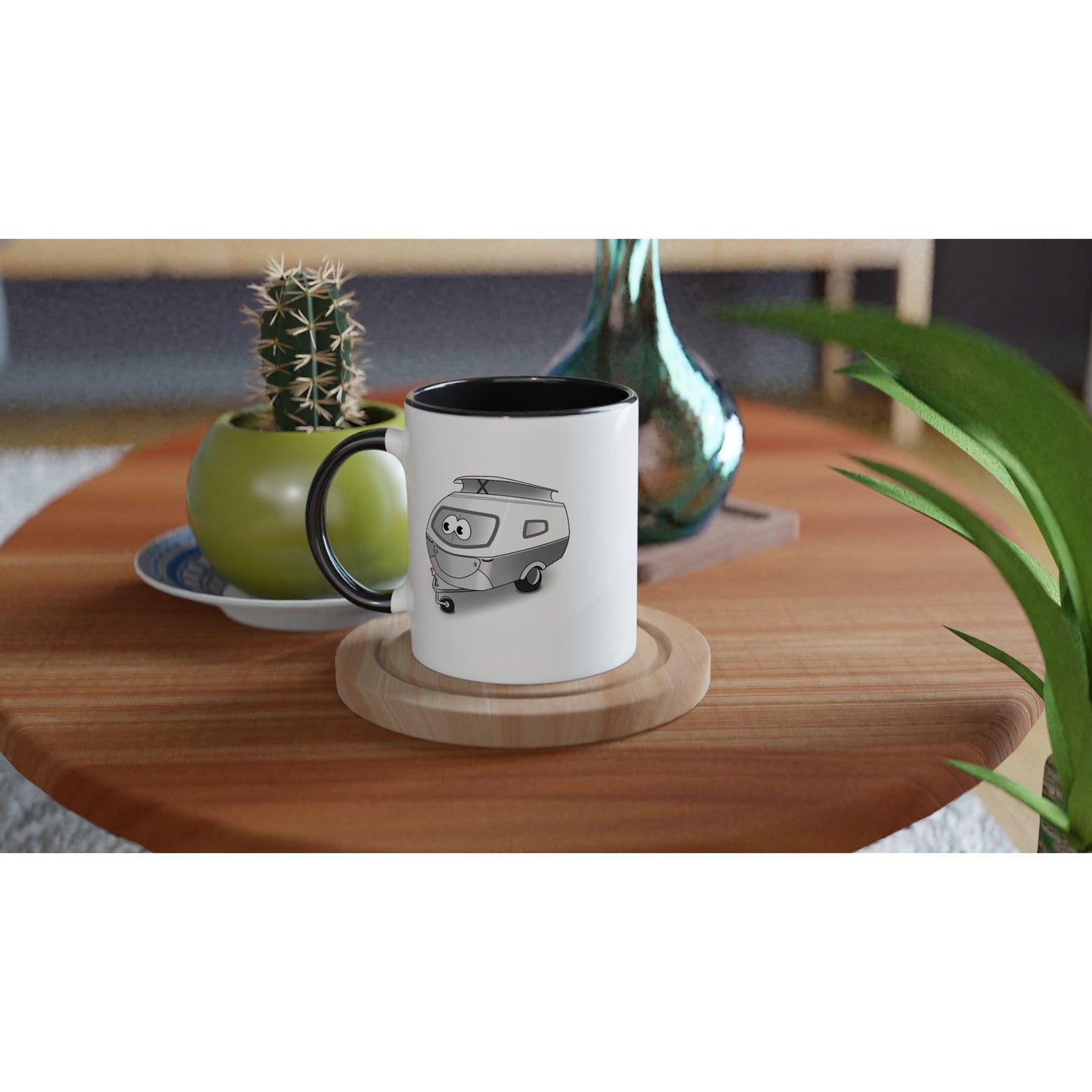 Das Bild zeigt eine Beispielaufnahme von dem Becher mit dem aufgedruckten Cartoon „Trollinchen“.