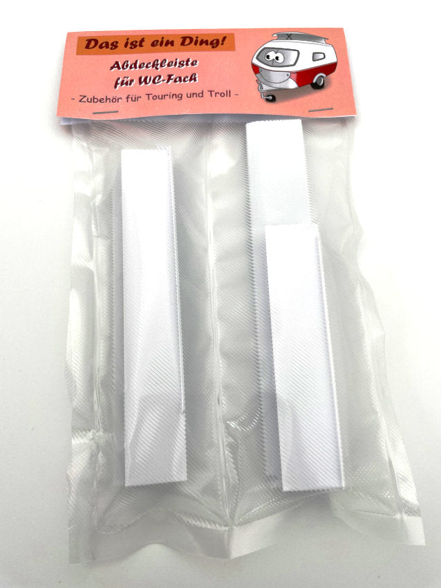 Lieferzustand der Abdeckleitse für das WC-Fach des Eriba der 500er Touring-Serie. Hier wird das erpackte Produkt von der Vorderseite dargestellt. Sichtbar sind die in Folie verpackten Teile der Leiste und das Verpackungslabel.