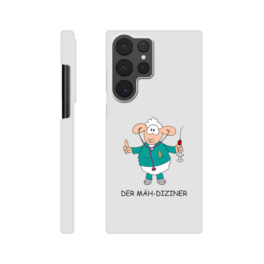 Eine Hülle für Samsung-Galaxy, weiß mit diversen Ausschnitten passend zum ausgewählten Gerät. Aufgedruckt ist auf der Hülle der Cartoon "DER MÄH-DIZINER von Antje Blumrodt Cartoons.