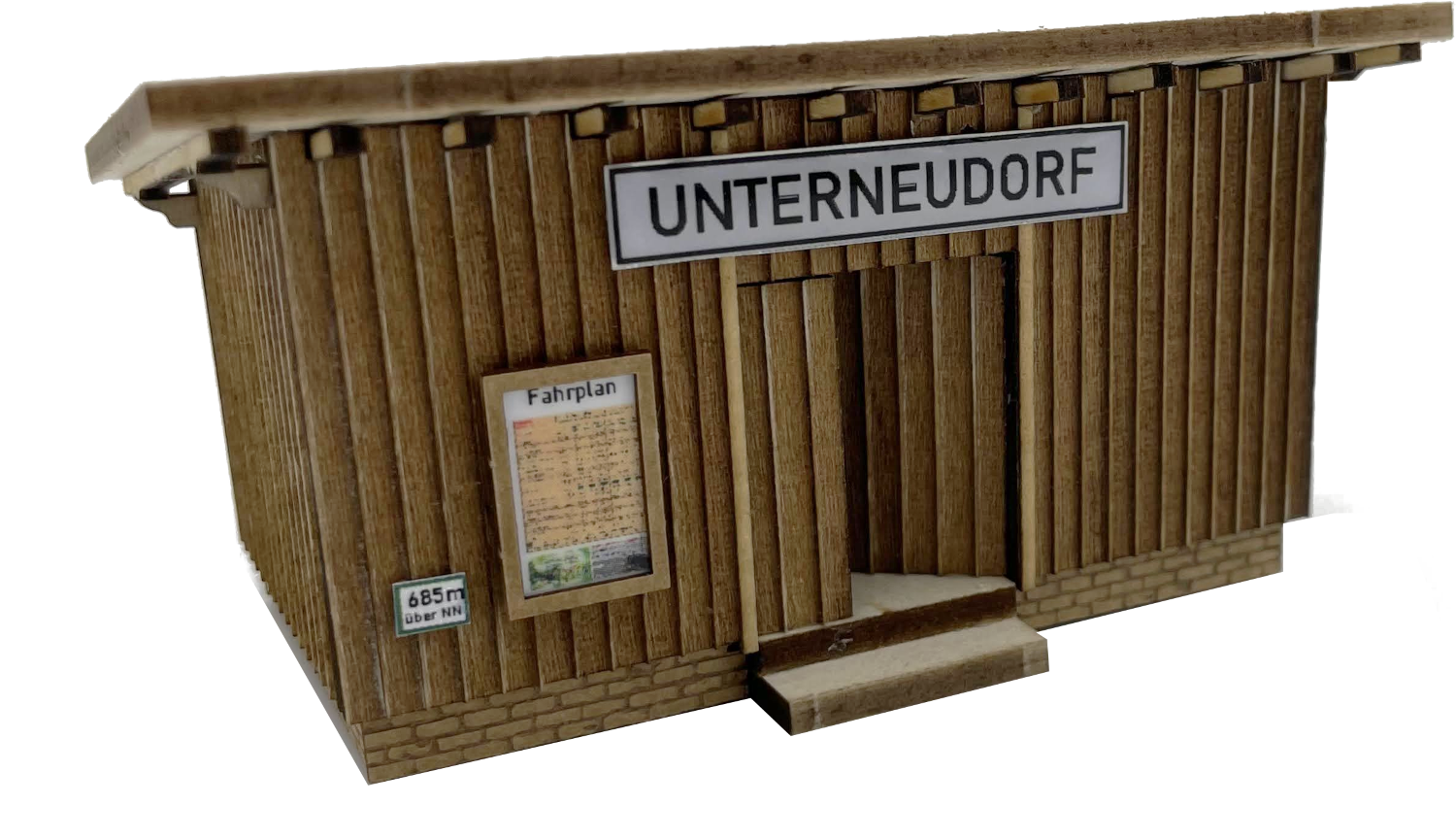 Nahaufnahme eines fertig montierten Modells des Wartehauses Haltepunkt "Unterneudorf" in Spur H0.